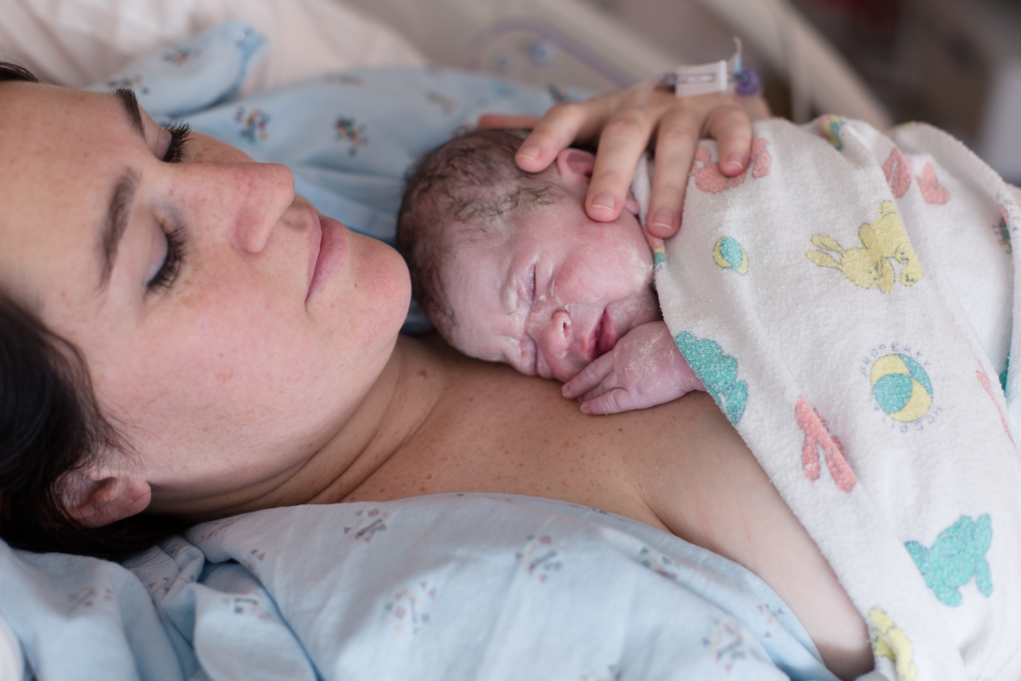 Mom Holding Baby with Vernix